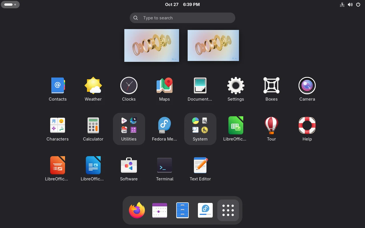 Fedora 45 Workstation 应用网格，含终端、文本编辑器、LibreOffice、Boxes、设置等默认应用